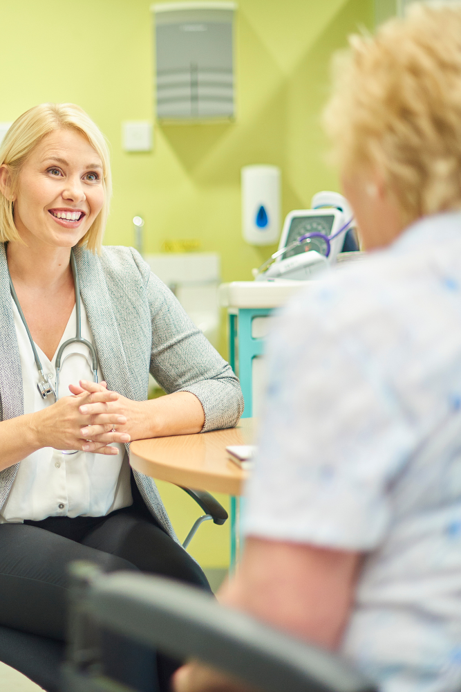 A GP speaking with a patient