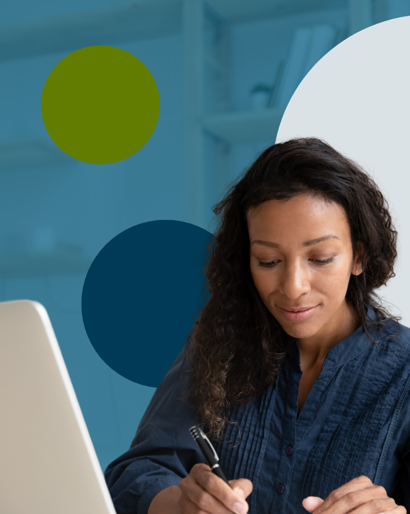 Woman taking notes during webinar